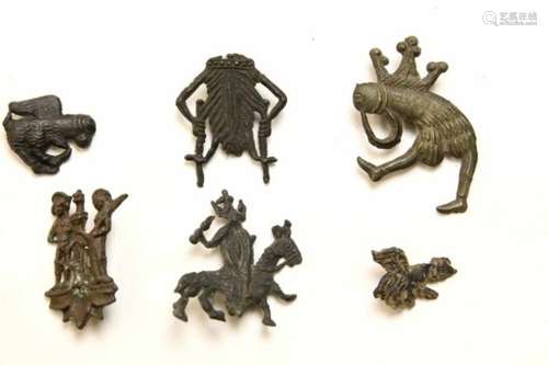 Collection of 5 tin-lead pilgrim amulets, ca. 15th century,on in the shape of a jumping vagina and