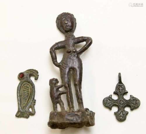 Bronze bird amulet, Frankish 3rd-9th century and Dutch led-tin pilgrims figure, ca. 15th century.