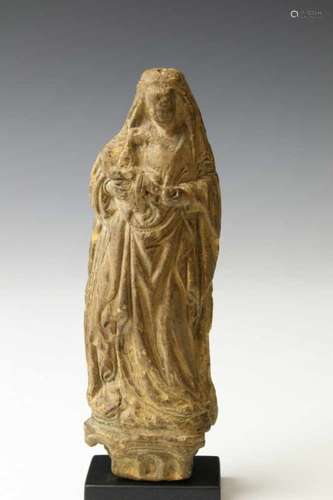 Utrecht, terracotta figure of a Madonna, 15th-16th centurywith elaborate robe, the Child damaged.;