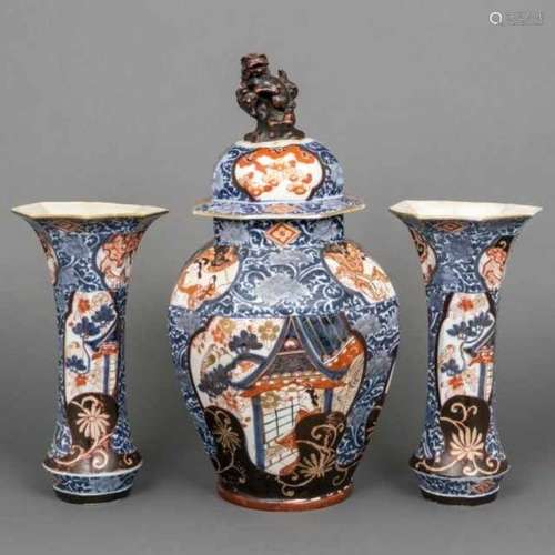 Three-piece porcelain Imari garniture with partial black enamel and decorated with bijin in