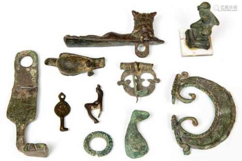 Three bronze Roman objects, ca. 2nd century;part of a lock decorated with lion and two birdshapes,