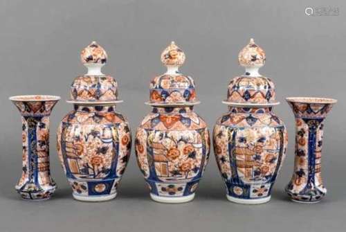 Five-piece vertical lobed porcelain Imari garniture with garden and floral motifs, Japan, not