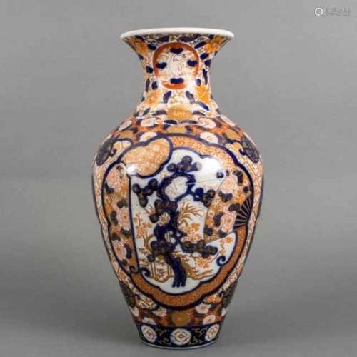 Baluster-shaped porcelain Imari vase with elaborate floral motif, the neck decorated with rabbits in