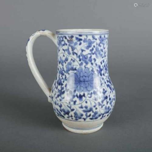 Blue and white porcelain Arita tankard decorated with kiku-karakusa motif, Japan, not signed, around