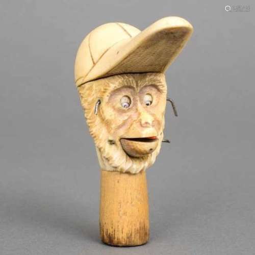 Ivory cane handle in the shape of a monkey wearing a hat, the eyes can move up and down, and the