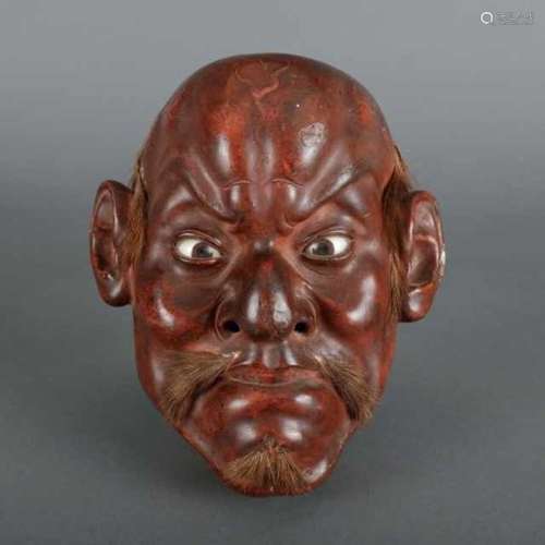 Red lacquer iki-ningyô mask with facial hair, the eyes inlaid with glass: caricature of a European