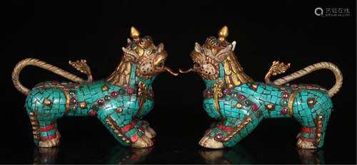 PAIR OF CHINESE GEM STONE INLAID BRONZE LIONS