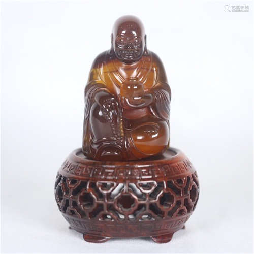 CHINESE AMBER SEATED LOHAN ON STAND