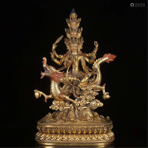 TIBETAN GILT BRONZE BUDDHIST GUARDIAN ON DRAGON