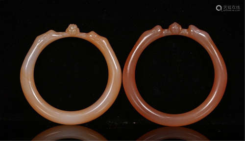 PAIR OF CHINESE AGATE DRAGON BANGLES