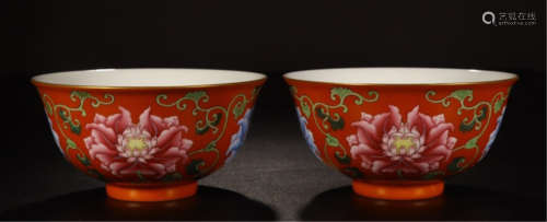 PAIR OF CHINESE PORCELAIN RED GROUND FAMILLE ROSE BOWLS