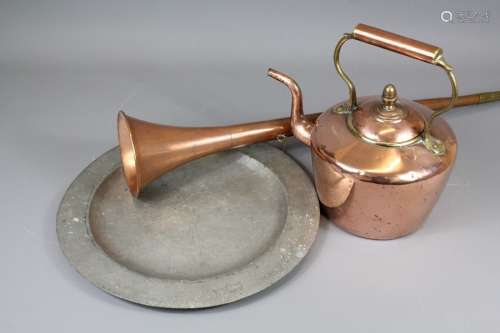 A Copper Fireside Kettle; the kettle together with a copper and brass Hunt Bugle, approx 127 cms l and an English pewter plate stamped 