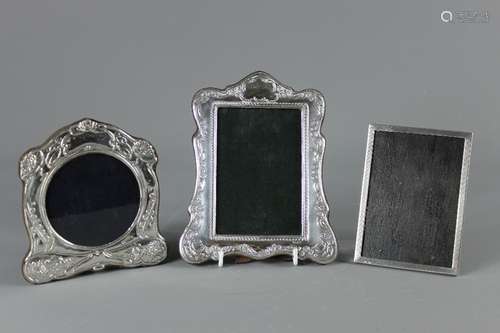 Three 20th Century Silver Photo Frames, this lot includes an Art Nouveau-style frame, Birmingham hallmark, mm Robert Carr approx 14 x 15 cms, silver frame Birmingham hallmark mm RH approx 16 x 20 cms and lastly a turned-engine frame Birmingham hallmark, mm G & Co Ltd, approx 10