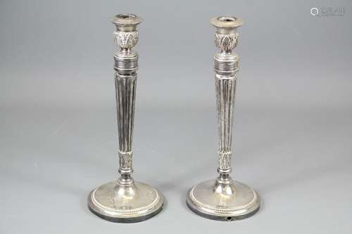 A Pair of Heavy Candle Stick Holders; the candle sticks approx 33 cms h