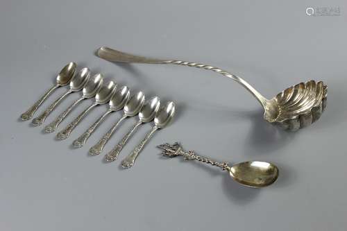 Eight American Gorham & Co Sterling Silver Tea Spoons, stamped sterling with UK import marks together with a serving spoon with a sailing ship finial Sheffield hallmark with additional import marks, approx 260 gms and a large silver-plated Danish punch ladle the bowl of scalloped design with a twisted stem