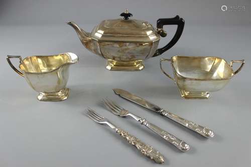 Miscellaneous Silver Plate, this lot includes an Art Deco tea trio comprising tea pot, sugar bowl and milk jug together with a quantity of fish knives and forks