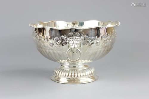 A Silver Plated Punch Bowl; the punch bowl decorated with embossed flowers and having lion mask handles, spreading pedestal base, approx 32 x 20 cms