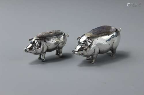 A Silver Novelty Piglet Pin Cushion, Birmingham hallmark, dated 1905, mm BPDC, approx 60 x 40 mm together with a smaller pig pin cushion, Birmingham, A & L Ltd 1906 approx 60 x 33 mm