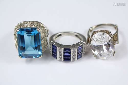 Five Silver Dress Rings, emerald-cut topaz ring approx 18 x 12 mm size K, an oval-cut CZ ring size M, approx 17