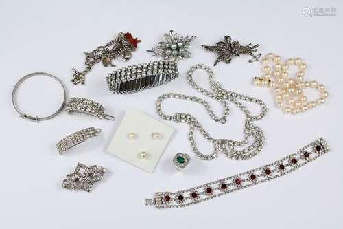 Miscellaneous Diamante Costume Jewellery, including necklace, bangle, faux ruby and diamante necklace, hair-clips, brooch and ring together with a sterling silver and black pearl brooch approx 6 cms w, silver and marcasite floral brooch, cultured pearl necklace, silver charm bracelet, silver bangle and pearl stud earrings