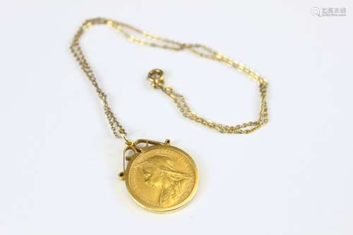 A Victorian 1900 Full Gold Sovereign, mounted in 9ct, suspended on a 9ct gold chain, approx 11