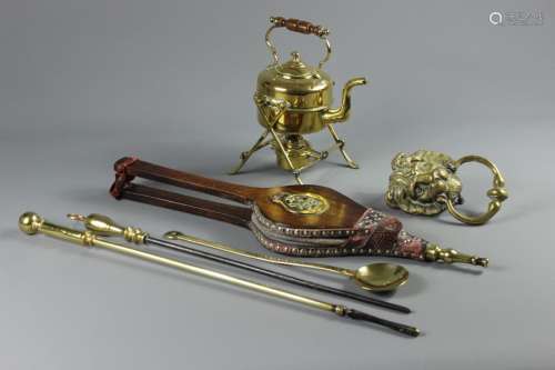 Antique Brass Fire-side Accessories, including fire-irons brass mixing spoon, kettle on stand and brass and oak bellows together with a brass lion mask door knocker
