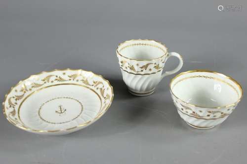 Late 18th/early 19th Century Porcelain Trio; comprising saucer, tea bowl and coffee cup with gilt sprig and anchor decoration and incised initialled 