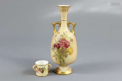 A Royal Worcester Blush Ware Vase, the twin-handled vase painted with dianthus and forget-me-not, approx 22 cms h puce factory mark together with a blush ware miniature trig, approx 4 cms h, with green factory marks