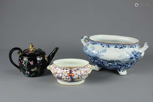 A Collection of Porcelain; including a black glazed Chinese teapot; the teapot having delicate floral and butterfly designs with a gilt figure sitting atop the lid, approx 14 cms h, together with a small Dresden tea bowl (no lid) approx 10 x 18 cms and a Spode tureen approx 23 x 18 cms depicting a pastoral scene