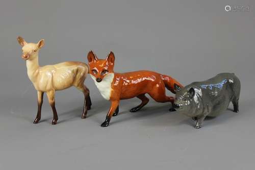 Beswick and Royal Doulton Animal Figures; the lot includes Beswick Doe approx 13 x 15 cms, a Beswick Fox approx 23 x 13 cms and lastly, a Royal Doulton Sow Pig approx 16 x 8 cms