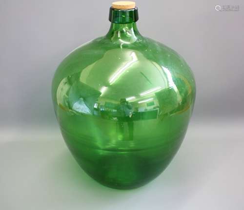 A Large Green Acid Bottle; the bottle measures approx 45 x 59 cms, and has a cork stopper