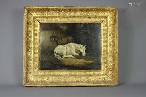 A 19th Century Oil on Canvas; the painting depicting an evening scene, an aged white horse and a donkey, unsigned, approx 39 x 30 cms, heavy gilt frame (af)