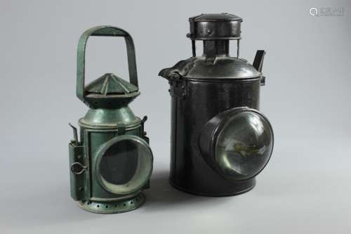 A Wakefield's of Birmingham Green Enamel Painted Railway Lantern approx 33 cms h, together with a large black enamel painted railway lantern, approx 33 cms