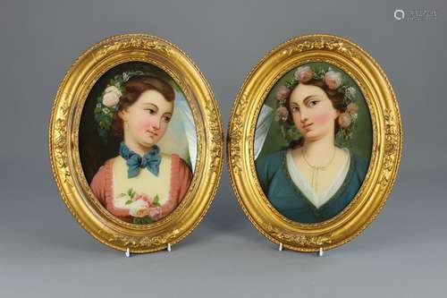 A Pair of Victorian Oval Glass Paintings, the oval pictures depicting portraits of young women with flowers in their hair, approx 23 x 31 cms, gilt frames