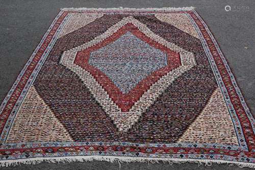 An Antique Persian Qashqai Wool Carpet