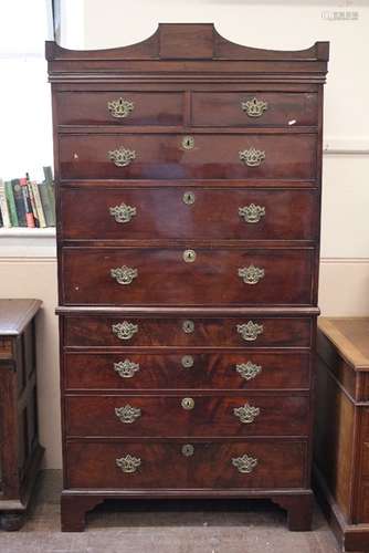 A Mahogany Chest on Chest; the bottom half having four graduated drawers, the upper half having two short and three long drawers, approx 103 x 57 x overall h approx 203 cms, on bracket feet