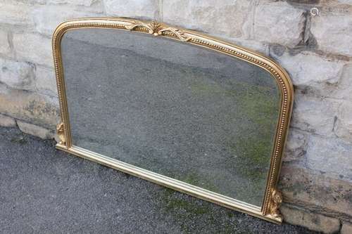 A Large Bevelled Mirror Overmantel Mirror;  surrounded by a beaded gilt-effect frame with decorative cornice, approx 122 x 81 cms