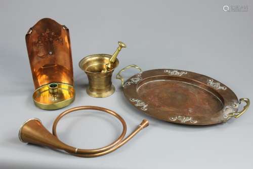 Miscellaneous Arts and Crafts Copper and Brass, including a twin-handled hammered copper Arts & Crafts tray; the flowers to rim, approx 34 x 26 cms, together with an antique pestle and mortar, copper and brass Arts and Crafts candle holder approx 23 cms and a miniature hunting horn