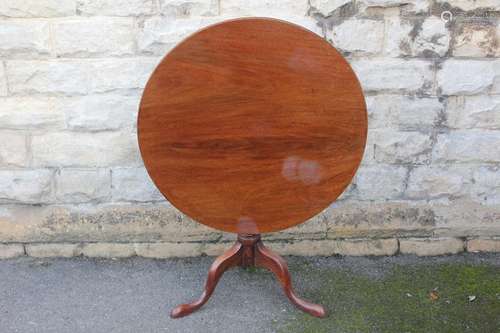 Antique Oak Tilt-top Supper Table, turned column terminating on tripod base, approx 85 x 20 cms