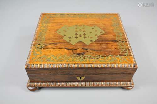 A Card Games Box, with decorative brass inlay, approx 23 x 20 x 8 cms, complete with two packs of playing cards