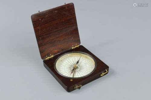 A Rosewood Hudson & Son Greenwich Compass, approx 8 x 8 cms, with blued markers