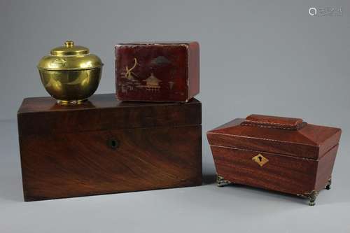 A Collection of Tea Caddies; including a Victorian mahogany tea caddy on decorative metal feet approx 20 x 12 x 12 cms with two tea compartments, a mahogany tea caddy approx 31 x 15 x 15 cms (inner mixing pot missing), a Chinese red lacquer box with black lacquer interior approx 13 x 10 x 10 cms, and a Lipton's Brass tea caddy stamped 