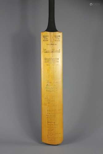 A Vintage Signed Cricket Bat signed in 1957 by the following gentleman and  team players including West Indies, England, Somerset and Gloucestershire