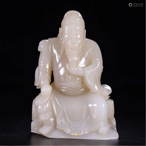 CHINESE WHITE JADE SEATED FIGURE