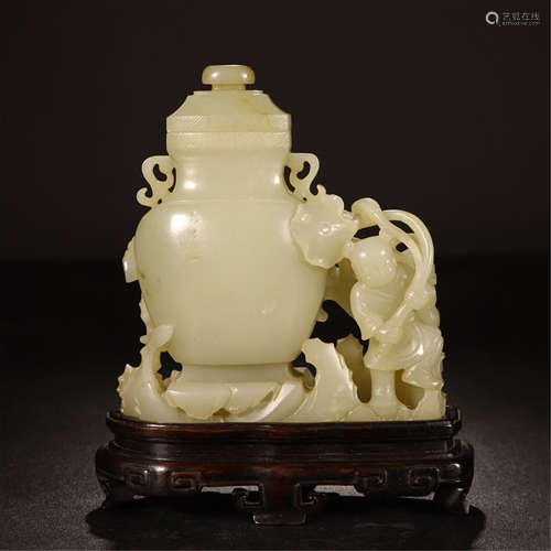 CHINESE YELLOW JADE BOY WITH LOTUS LIDDED VASE