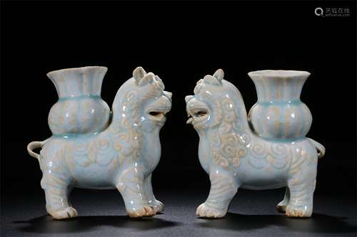 A Pair of Chinese Hutian-Type Glazed Porcelain Foo-Dog Decorations