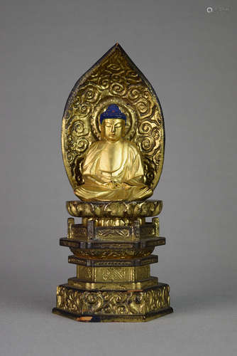 A Japanese Carved Wood Figure of Buddha