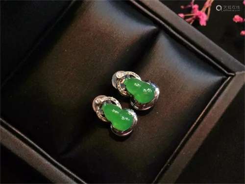 A Pair of Chinese Carved Jadeite Earrings