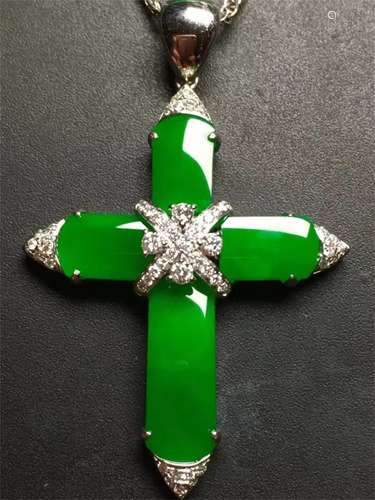 A Chinese Carved Jadeite Cross Pendant