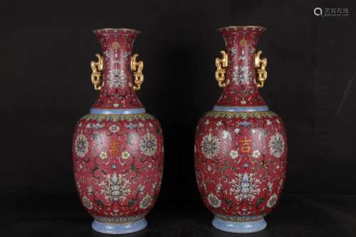A Pair of Chinese Red Ground Famille-Rose Porcelain Vases